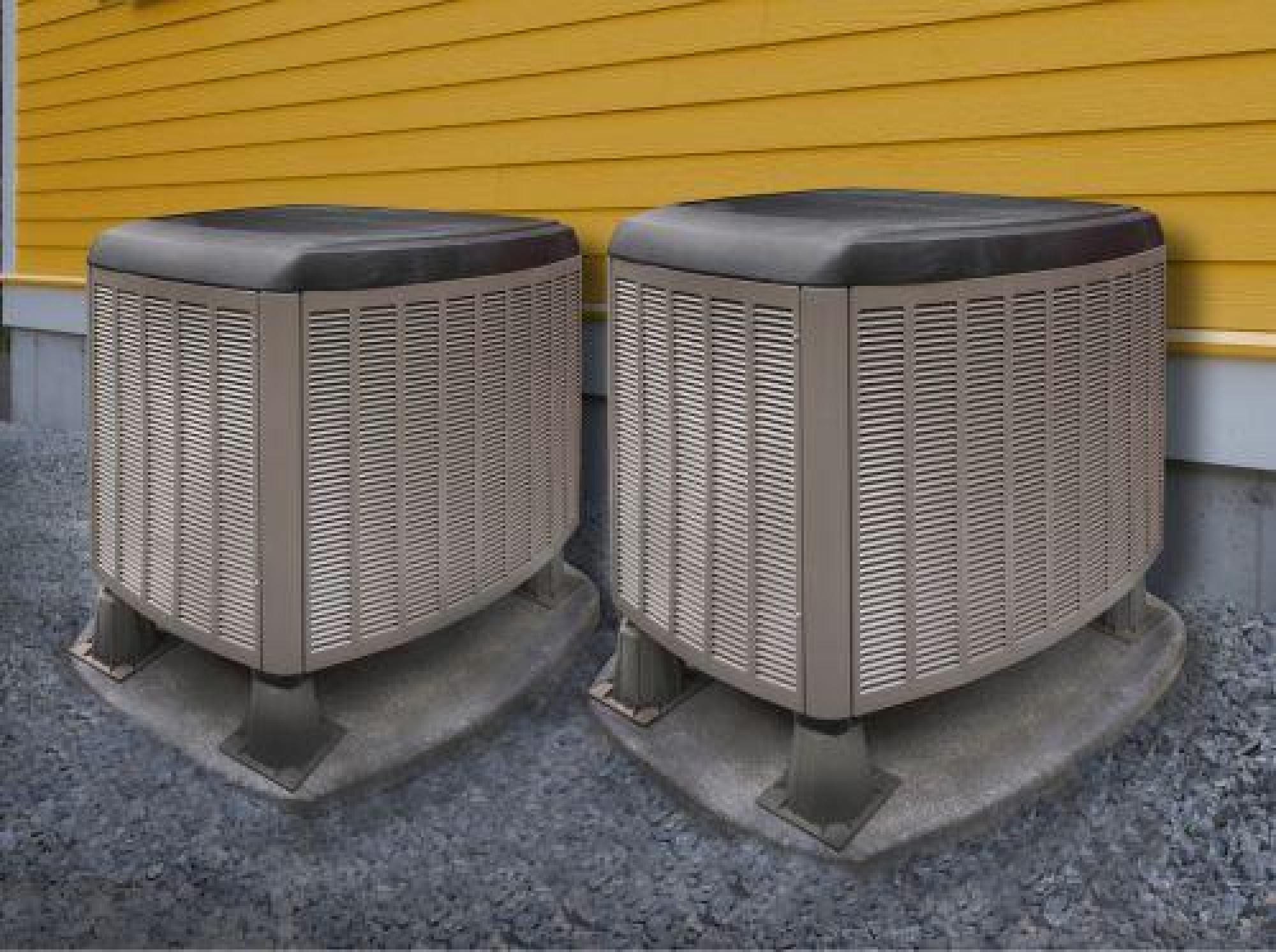 Two HVAC Units Installed Outside A Home