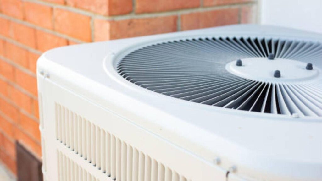 Close up of the top of an outdoor AC unit